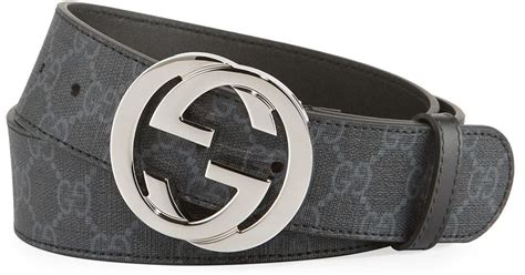 black gucci belt with black buckle.